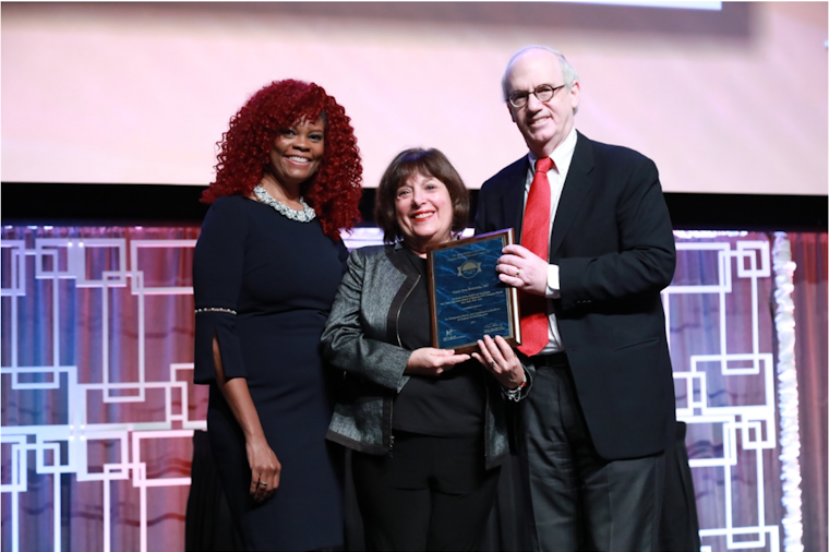 ACGME Board Chair Dr. Jeffrey P. Gold and ACGME Awards Liaison DeLonda Dowling presented Dr. Bernstein with the Gienapp Award at the 2019 ACGME Annual Educational Conference