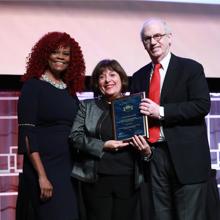 2019 Gienapp Awardee Dr. Carol Bernstein is presented her award at the 2019 Annual Educational Conference