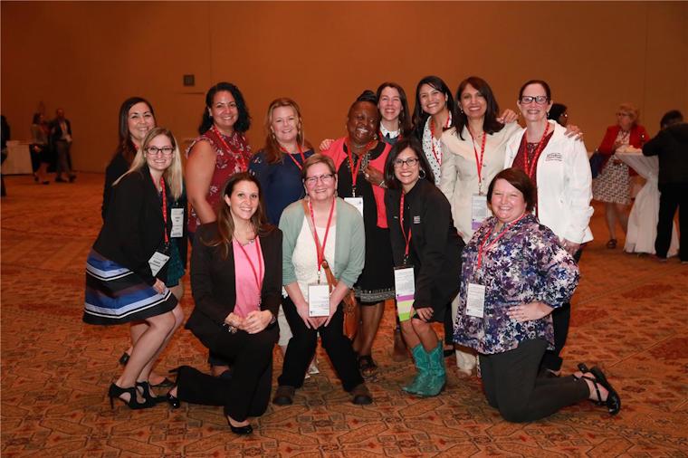 Dr. Juanita Braxton (center) and colleagues from the Association of Radiation Oncology Program Coordinators (AROPC) connecting at the 2018 ACGME Annual Educational Conference